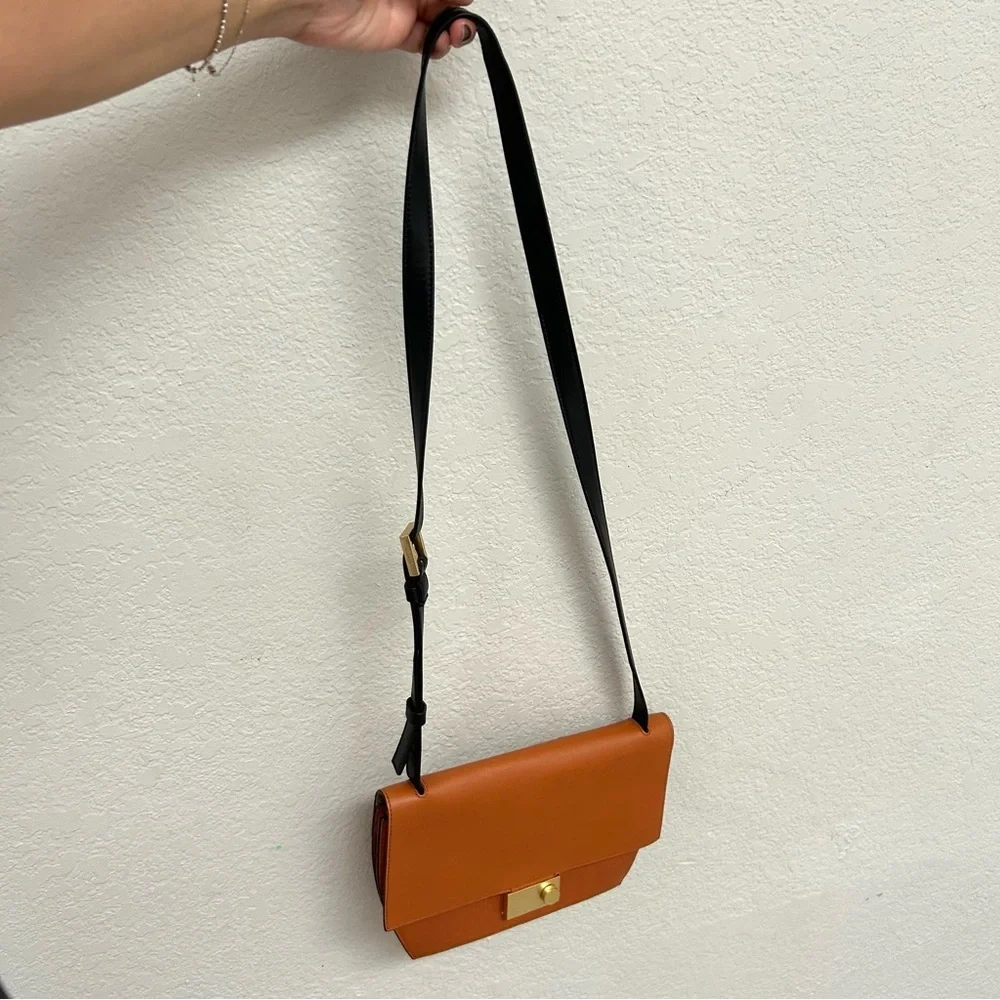 All Saints goldtone logo